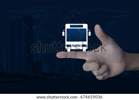 Bus flat icon on finger over world map and modern city tower, Business transportation service concept, Elements of this image furnished by NASA