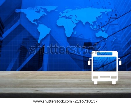 Bus flat icon on wooden table over world map, modern city tower and skyscraper, Business transportation service concept, Elements of this image furnished by NASA