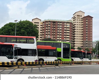 Bus Interchange Near Residential Apartments On A Cloudy Day