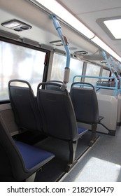 Bus Interior: Straight Front And Rear View Of Empty Seats On Double Decker. Blank Advertising Space; For Mockup Display; Seat Sticker Wrap.