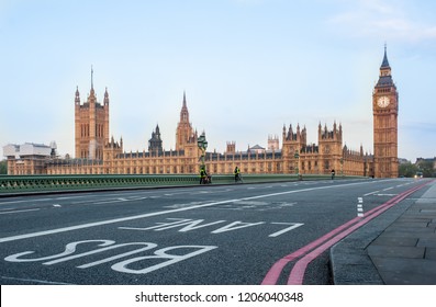 Bus Lane On Westminster Bridge - London, UK - Houses Of Parliament And Big Ben Tower At Dawn. Covid 19 Coronavirus Lockdown