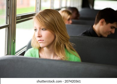 Bus: Sad And Lonely Girl On School Bus