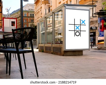 Bus Shelter At A Bus Stop. Composite Image Of Template Glass Light Box Side Poster Ad Panel And Sample Place Holder. Base Image For Mock-up. Advertising Concept. Blurred Urban Background