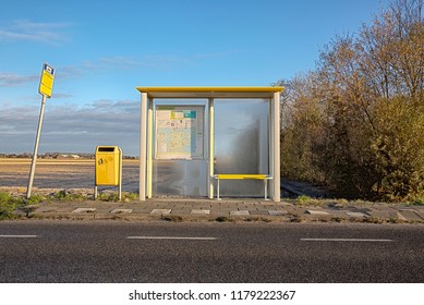 Bus Shelter With Yellow Garbage Can In Anna Paulona, North Holland, The Netherlands