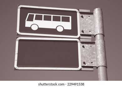 Bus Sign against Sky Background in Black and White Sepia Tone - Shutterstock ID 229491538