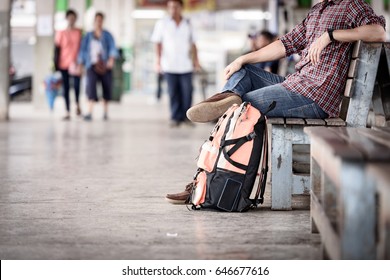 Bus Station With Asian Tourist Backpacking, Waiting For The Bus.