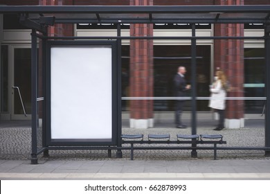 Bus station billboard with blank copy space screen for your advertising text message or promotional content, empty mock up Lightbox for information, stop shelter clear poster in urban city scene