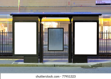 Bus Stop Advertising. Two Blank Billboards In City Street At Night