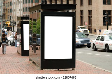 Bus Stop Billboard In USA City For Outdoor Advertising. Brick Sidewalk, Traffic, People In The Background