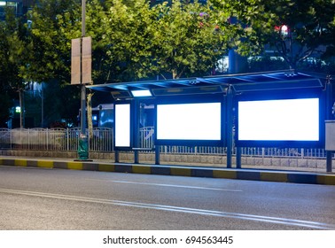 bus stop with blank billboard at night,shanghai,china. - Shutterstock ID 694563445