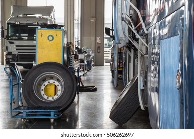 Bus And Truck Waiting For Service In The Garage