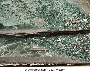 bus window. Closeup view of broken car front glass. The broken glass window background,abstract concept.