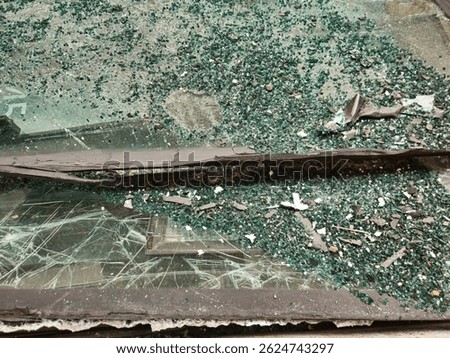 bus window. Closeup view of broken car front glass. The broken glass window background,abstract concept.