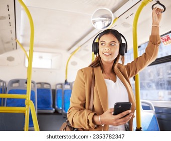 Bus, woman and phone with headphones on public transport, music and smile with business commute. City travel, stop and internet app of a female professional on a mobile with networking on metro - Powered by Shutterstock