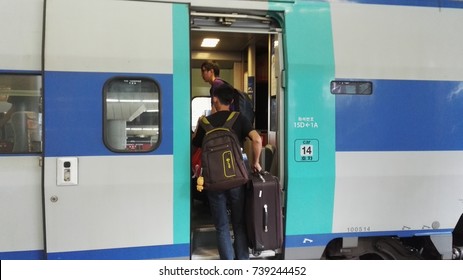 Busan, South Korea  - September 9, 2017:  Closed-up Side View Of Korean KTX High-speed Bullet Train At Busan Train Station. Passengers On Board The Train. 