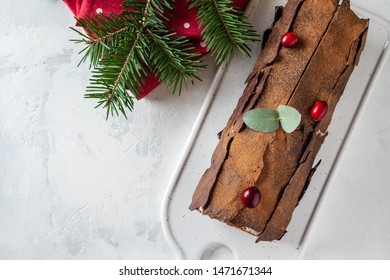 Bush de Noel Christmas Log Cake and New Year background. Copy space.