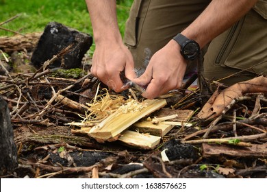 Bushcraft fire starting with knife and firesteel - Powered by Shutterstock