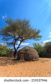 Bushman San People Traditional Huts In Kalahari Botswana.