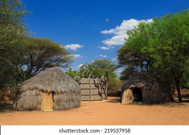 Bushman San People Traditional Huts In Kalahari Botswana.