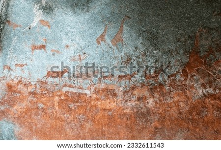 Bushmen Stone age prehistoric animals carvings in the cave Matobo Hills, Zimbabwe