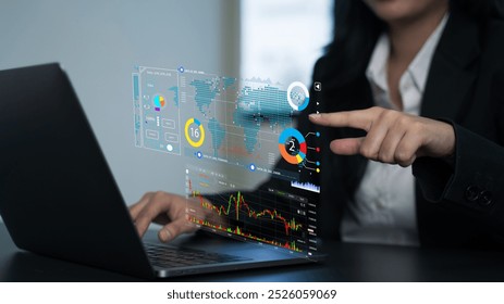 Busines using a computer to complete Individual income tax return form ai online for tax payment. Various financial documents, graphs, reports.