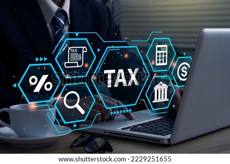 Busines using a computer to complete Individual income tax return form online for tax payment. Government, state taxes. Tax time Concept.