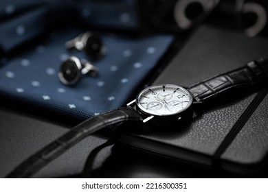 Business Accessories. Mens Watch And Cufflinks Isolated On Black Background.