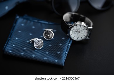 Business Accessories. Mens Watch And Cufflinks Isolated On Black Background.