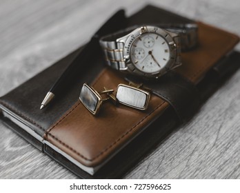 Business accessories. Notepad with watch and cuff 