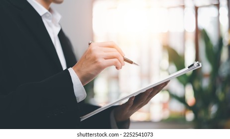 business accounting documents,auditor,management and auditing of office documents,Reports for Tax Time Analysis, Office worker working with documents, pre-approval quality assessment