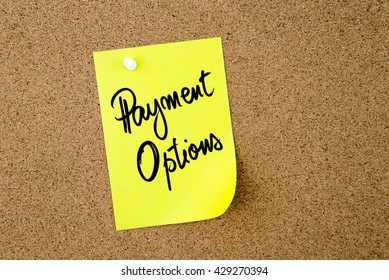 Business Acronym PO as Payment Options written on yellow paper note pinned on cork board with white thumbtack, copy space available