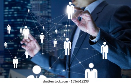 Business administrator in action of manpower or human resource planning or business organisation on a virtual dashboard. - Shutterstock ID 1336612238