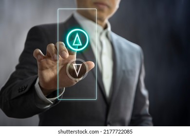 Business administrator pressing the virtual elevator button for next levels up in concept of more advance to a success.