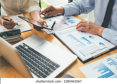 Business Advisor Analyzing Financial Figures Denoting The Progress Internal Revenue Service Checking Document. Audit Concept