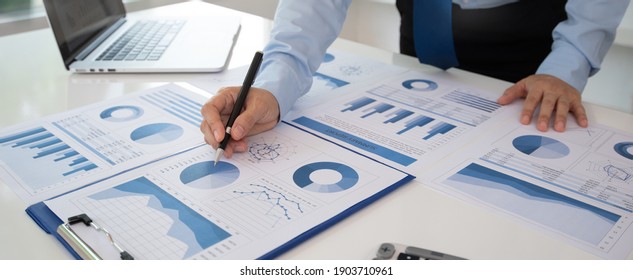 Business analyst checking in financial statement for audit internal control system. Accounting and Financial Concept.