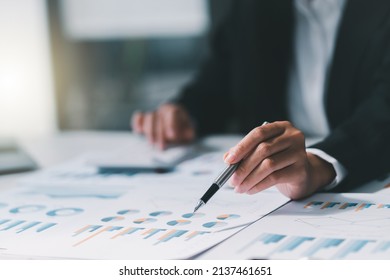 Business analyst checking in financial statement for audit internal control system. Accounting and Financial Concept. - Shutterstock ID 2137461651