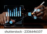 Business analytics concept and data management system on tablet to generate reports with KPIs and metrics connected to corporate strategy database for finance, operations, sales, marketing.
