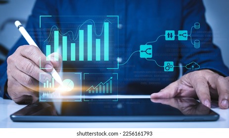 Business Analytics and Data Management System concepts on computers to generate reports with KPIs and metrics connected to corporate strategy databases for Finance, Operations, Sales, Marketing.