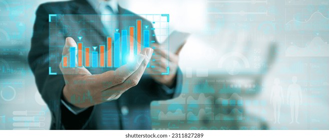 Business Analytics and Data Management System. A Businessman Holds and Presents a Financial Graph, Chart, Report from the Database for Finance, Operations, Sales, and Marketing - Shutterstock ID 2311827289
