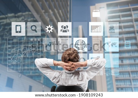 Business Analytics and Data Management System, businessman with infographic