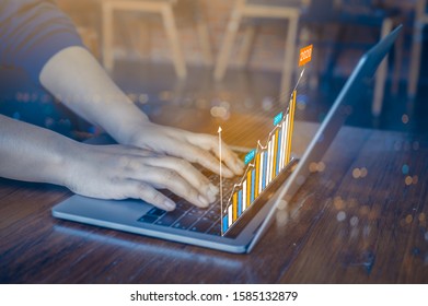 Business analytics and financial concept, Plans to increase business growth and an increase in the indicators of positive growth in 2020 floating above digital laptop computer. - Shutterstock ID 1585132879