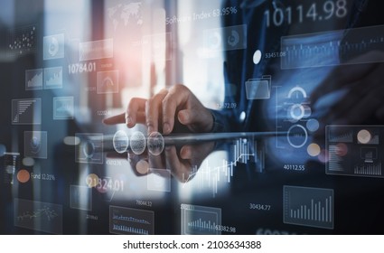 Business Analytics, Business Intelligence, Market Research Concept. Data Scientist Working On Laptop With Big Data, Financial Graph Performance, Futuristic Technology Background