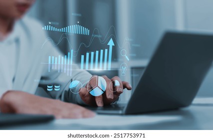 Business analytics tools charts and graphs with statistics to analyze business potential and forecast future development of companies growth with Businessman using laptop. - Powered by Shutterstock