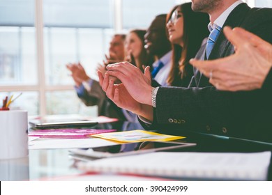 Business Applause. Group Of Businessmen Clapping Hands During A Business Convention