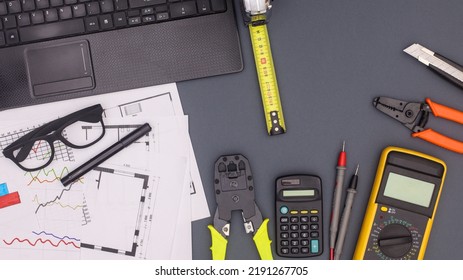 Business And Architecture Table With Plans And Construction Tools. Flat Lay