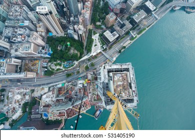 Business area near waterside in Hong Kong, China, view from crane on construction site, view from New World Center