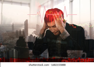 Business Asian Man Stress And Depress From Corona Virus Covid Pandemic Outbreak News Topic. He Paranoid World Of Economy Finance And Marketing. Heart Attack With Stock Concept.