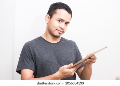 Business Asian Man Use Ipad Tablet Computer Standing On White Background