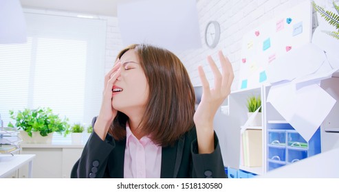 Business Asian Woman Stressed And Angry Yelling In The Office