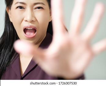 Business Asian Women Are Scared And Show Hand Sign To Tell Five Things. Lady Was Decline And Ban Communication. Idea Concept Make Business Failed. Stop To Do Behavior Before Your Health Is Bad.